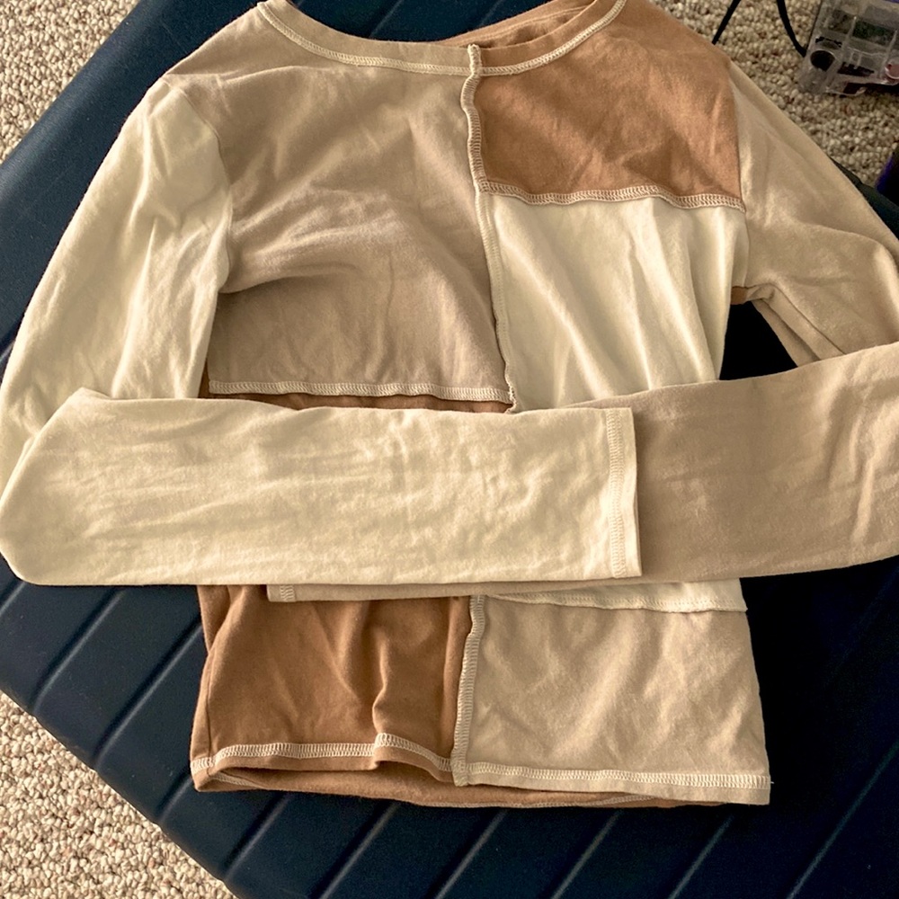 I am selling two shirts. They are long sleeve.